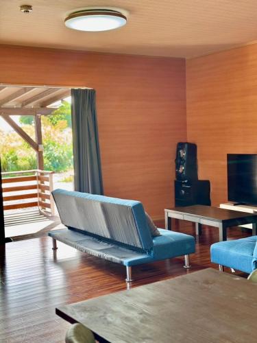 TV a/nebo společenská místnost v ubytování AZホテル Inn 奄美万屋 - Villa with private outdoor Jacuzzi