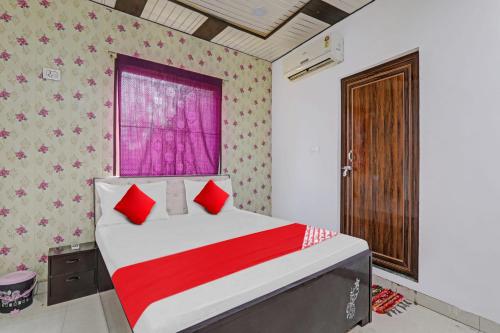 Postel nebo postele na pokoji v ubytování Hotel O SP PALACE