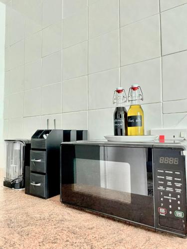 Una cocina o cocineta en The Express Apartment
