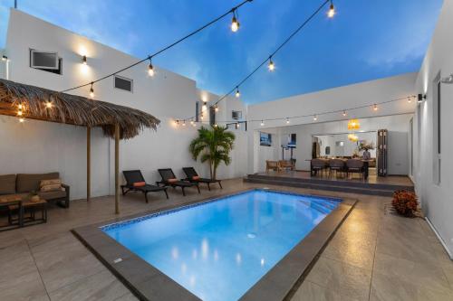 Πισίνα στο ή κοντά στο Villa Sol A Luna - Mambo Beach