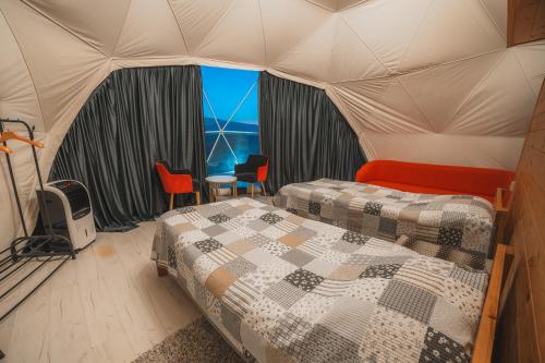 Ένα ή περισσότερα κρεβάτια σε δωμάτιο στο Asman Glamping