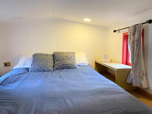 Postel nebo postele na pokoji v ubytování Tiny house en Chicureo
