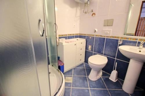 Kúpeľňa v ubytovaní Apartment Krivec