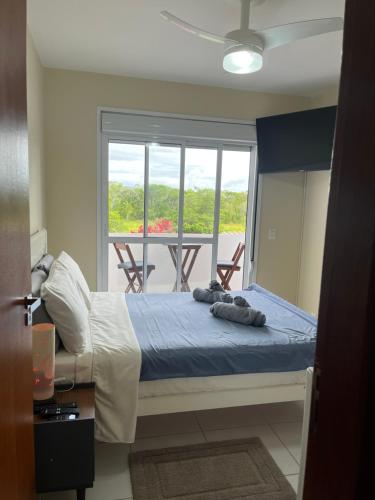 Quarto Suíte de praia Campeche Florianópolis房間的床