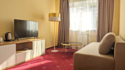 TV a/nebo společenská místnost v ubytování Hotel Ternopil
