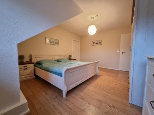 Postel nebo postele na pokoji v ubytování Haus Jümmeblick