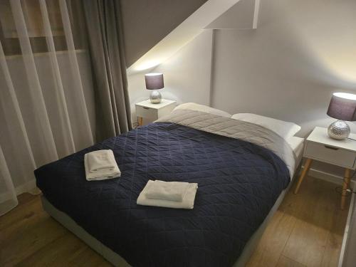 Postel nebo postele na pokoji v ubytování Aparthotel Warszawa