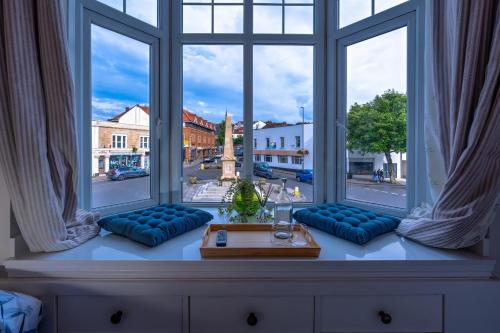 a large window with a view of a city street at Victorian High Street flat, parking, WiFi in Bristol
