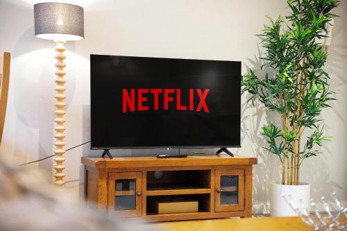 a flat screen tv sitting on top of a table at NEW! 2BR in Stephenson House in Stockton-on-Tees