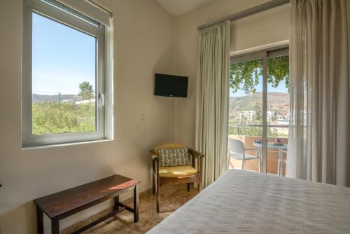 Postel nebo postele na pokoji v ubytování Hotel Peli