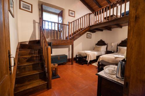 Postel nebo postele na pokoji v ubytování Casa De Anquiao - Turismo de Habitação
