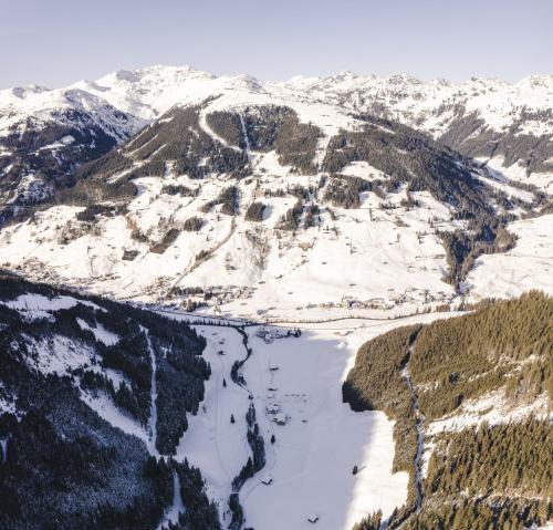 an aerial view of a snow covered mountain at Traumhotel Alpina Superior Adults only Hotel in Gerlos