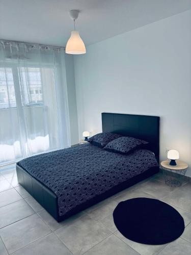 Katil atau katil-katil dalam bilik di Cosy T3 Beauzelle proche MEETT, tram et aéroport