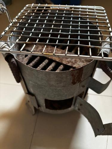 a metal grill sitting on top of a table at Hireath! in Kelve Road