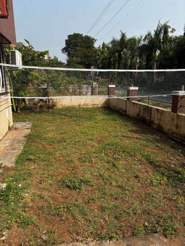 a fenced in yard with a fence at Hireath! in Kelve Road