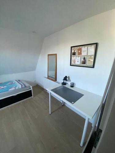 Ένα ή περισσότερα κρεβάτια σε δωμάτιο στο Ferienhaus FIO