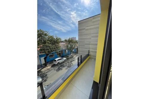 a view from a window of a car on a street at Globo Lar Studios in Limeira