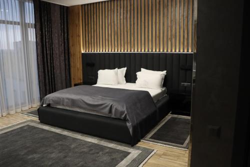 Una cama o camas en una habitación de Sobkoff