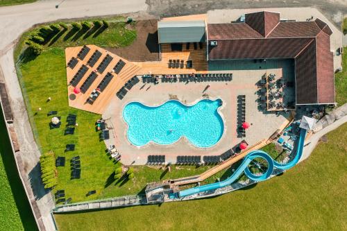 an aerial view of a resort with a swimming pool at First Camp Gol Hallingdal in Gol