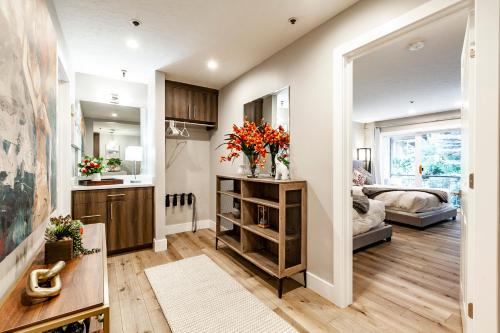 a kitchen and living room with a couch and a table at Treasure Mountain Inn in Park City