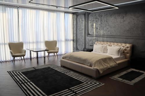Una cama o camas en una habitación de Sobkoff