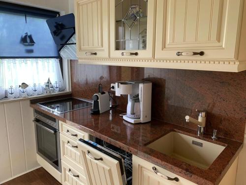 Köök või kööginurk majutusasutuses Das NURDACH Haus