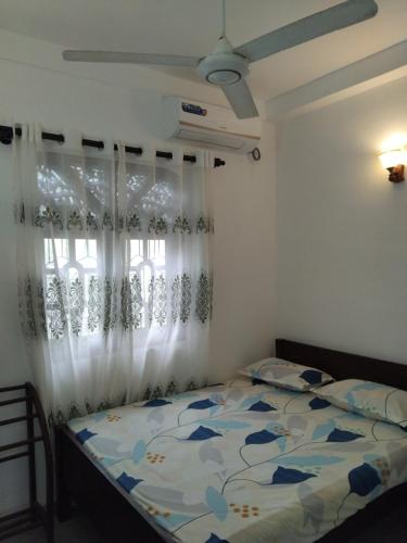Ένα ή περισσότερα κρεβάτια σε δωμάτιο στο Dream Palace Villa