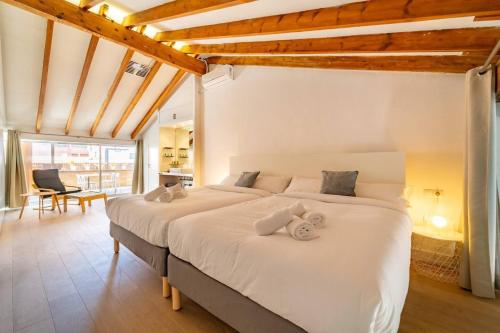 Posteľ alebo postele v izbe v ubytovaní LovelyLoft Altamira Duplex