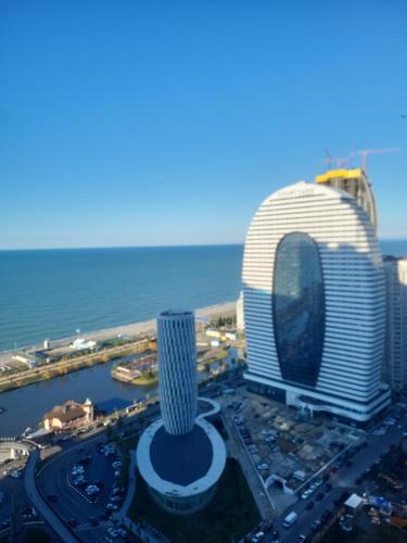 a view of the emirates hotel in dubai at Batumi Orbi D2, V&O seaview studio in Batumi