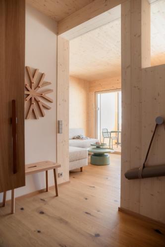 Cama o camas de una habitación en biYou Ecoquartier in den Bergen