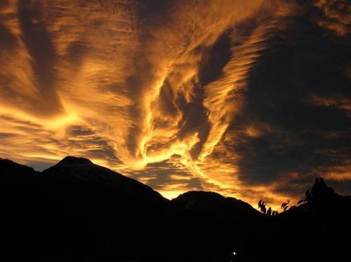 a cloud formation in the sky at sunset at Gästehaus Auer in Holzgau