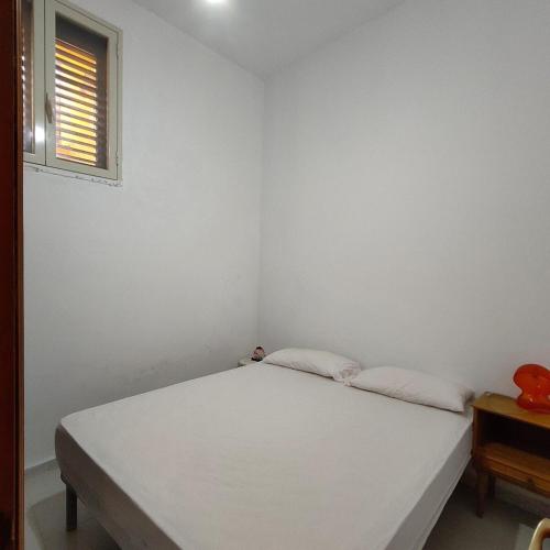 Postel nebo postele na pokoji v ubytování Appartamento di Lorenzo vista Mare