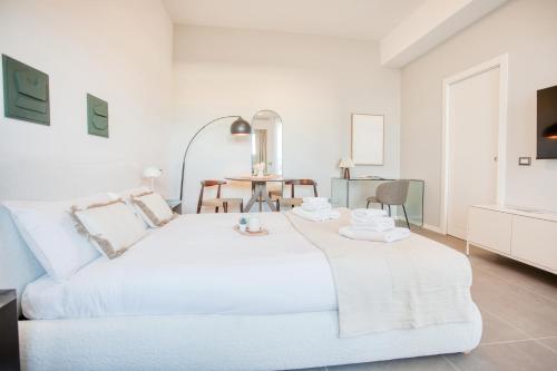 Ένα ή περισσότερα κρεβάτια σε δωμάτιο στο Easylife - Milano - Calco 2P3 - Sant'Agostino