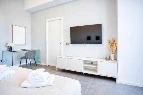 Ένα ή περισσότερα κρεβάτια σε δωμάτιο στο Easylife - Milano - Calco 2P3 - Sant'Agostino