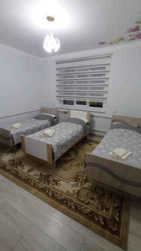 Ένα ή περισσότερα κρεβάτια σε δωμάτιο στο Ademi guest House