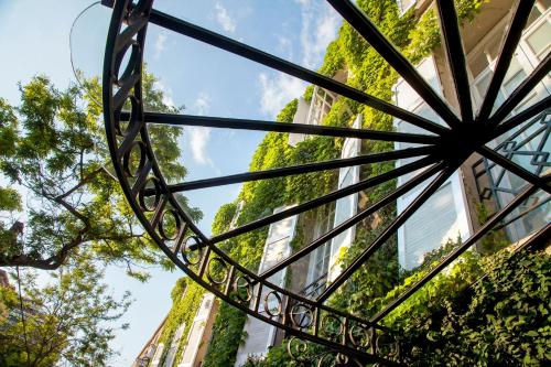 a view of a building from under a glass ceiling at Hotel Boutique Le Reve in Santiago