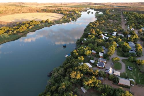 an aerial view of a river and a farm at Sonvanger Selfcatering in Orania
