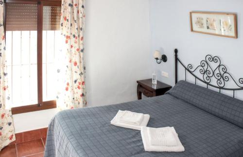 Posteľ alebo postele v izbe v ubytovaní Comfortable House in Estepa with Shared Pool