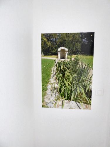 a picture of a garden with a gazebo at Maison confortable au cœur de Brioude avec parking privé. in Brioude