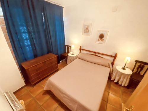 Ένα ή περισσότερα κρεβάτια σε δωμάτιο στο Chic apartment in Tolva, mountain view, 75 m², fireplace