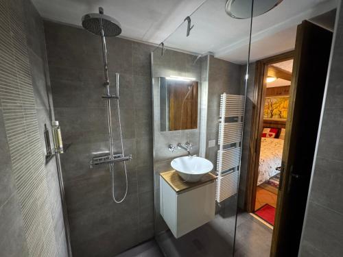 Koupelna v ubytování Chalet Il Pruno del Rosa