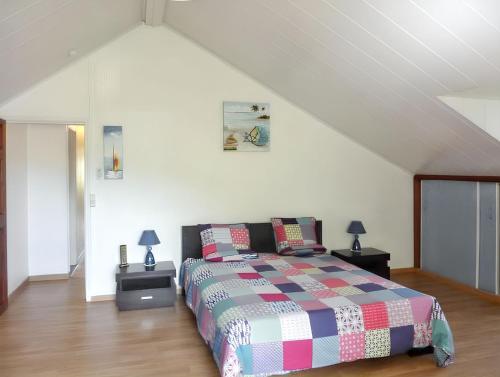 Postel nebo postele na pokoji v ubytování Appartement élégant avec vues panoramiques, Bois-de-Nèfles, 90 m²