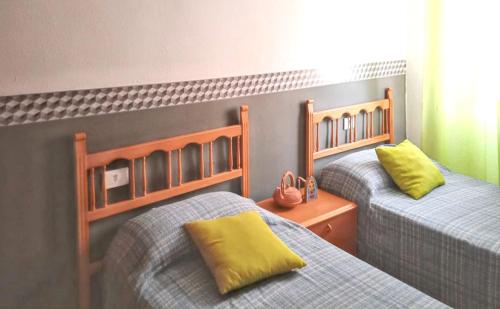 Un pat sau paturi într-o cameră la Spacious Apartment in Benicàssim with Mountain View