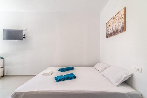 Ένα ή περισσότερα κρεβάτια σε δωμάτιο στο Lovely seaside studio, Crete