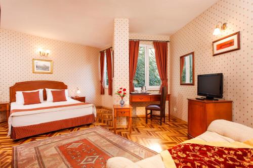 Кровать или кровати в номере Hotel Erguvan - Special Category