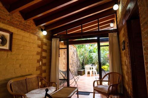 Ruang duduk di Cabaña en Tepoztlán con vista a la montaña