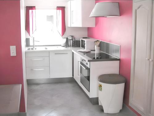 Η κουζίνα ή μικρή κουζίνα στο Appartement moderne avec terrasse à Saint-Gènes-du-Retz, 80 m²