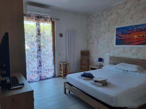 Letto o letti in una camera di La casa di mare