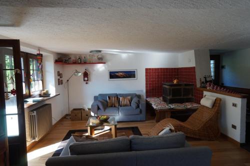 Posezení v ubytování Chalet Il Pruno del Rosa