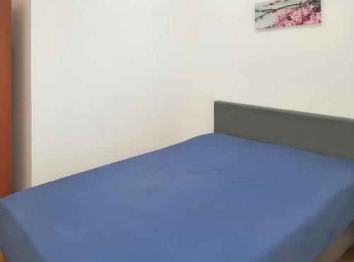 Ένα ή περισσότερα κρεβάτια σε δωμάτιο στο Comfortable apartment in Pataias with garden and shared pool